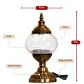 11-inch vintage brass metal frame table lamp with clear glass globe, bulb, and plug switch